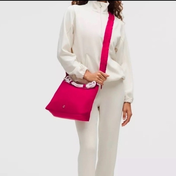 pink lululemon bag Everywhere Belt 1L Peloton Apparel Side Pockets For Quick Access To Water Bottle And Small Items City Essentials Nano Shoulder Bag